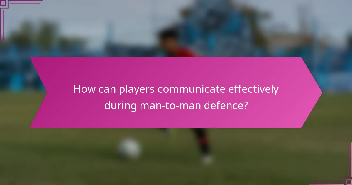 How can players communicate effectively during man-to-man defence?