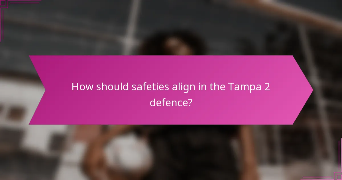 How should safeties align in the Tampa 2 defence?
